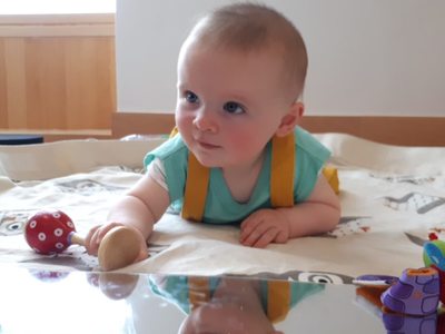 Baby Evelyn (8 mths) playing with the ELI My Place To Play, playmat set.