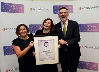 basis.point receiving recognition from the Charities Institute Ireland L-R Joanne Shaw, basis.point Head of Marketing, Edel O'Malley basis.point CEO and Declan O'Sullivan, basis.point Board Director.