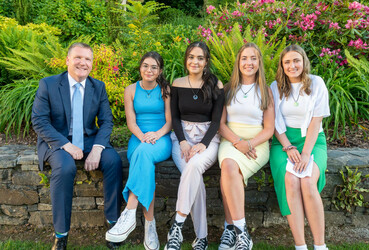 [L-R] Minister for Finance Michael McGrath with young entrepreneurs from Coláiste Pobail Bheanntraí in County Cork, Elaine McSweeney, Tempy Stock, Meadhbh Sammon and Aoife O'Shea. Picture: John Allen.