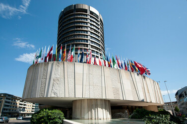 The Bank of International Settlements headquarters in Basel, Switzerland. The EU has announced that it will delay implementation of the Basel III framework.