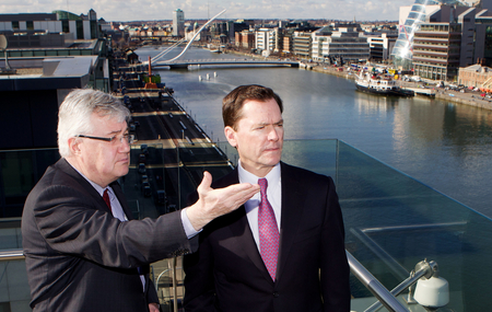 Job creators: 'These statistics represent further evidence of what is a remarkable success story. My view is that international financial services will post a net employment increase in 2010', said William Slattery, chief executive of biggest IFSC employer State Street Ireland, who is pictured with international State Street head Jay Hooley, (l-r) at the top of State Street's new Dublin offices which they opened this month.