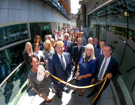 Mike McKerr, managing partner, EY and Mary Mitchell O'Connor, Minister for Jobs, Enterprise and Innovation at the opening of EY's second office in Dublin.